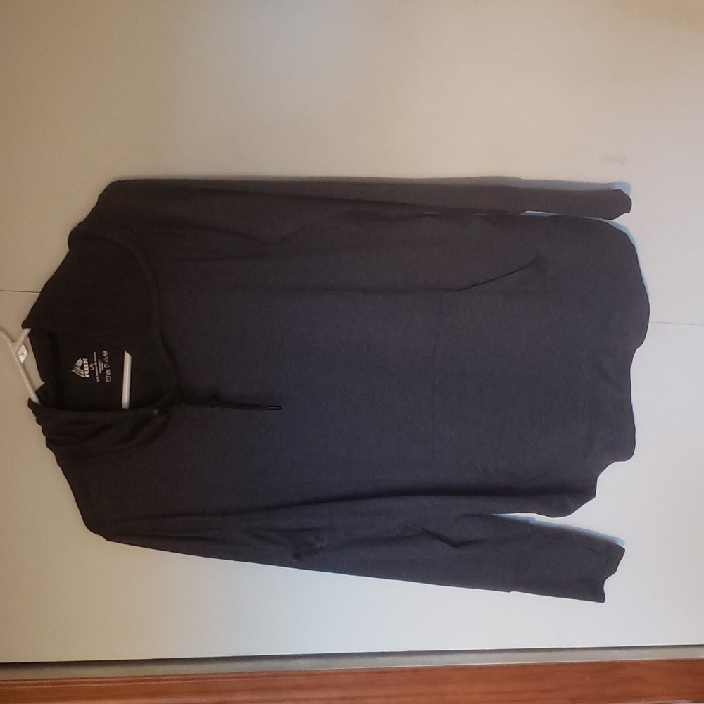 A reebok spandex jogging top with hood and thumb wholes in the cuffs from reebok